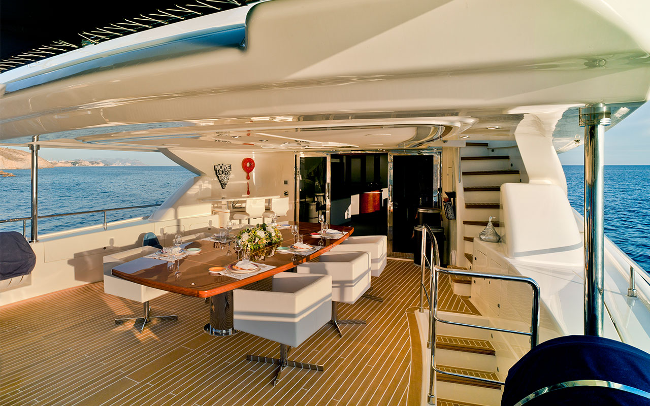 Yacht Charter Ibiza CRN 130 upper deck exterior dining