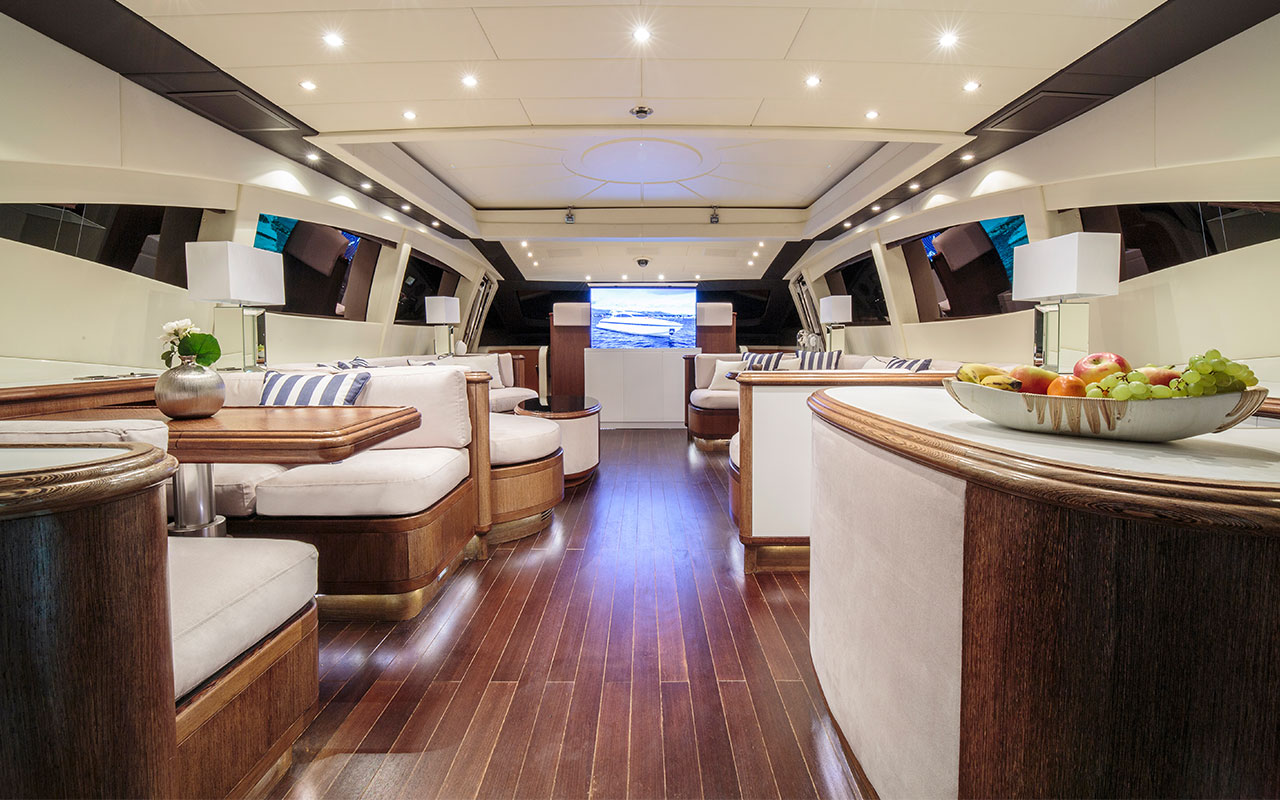 Yacht Charter Ibiza Mangusta 92 salon retractable TV