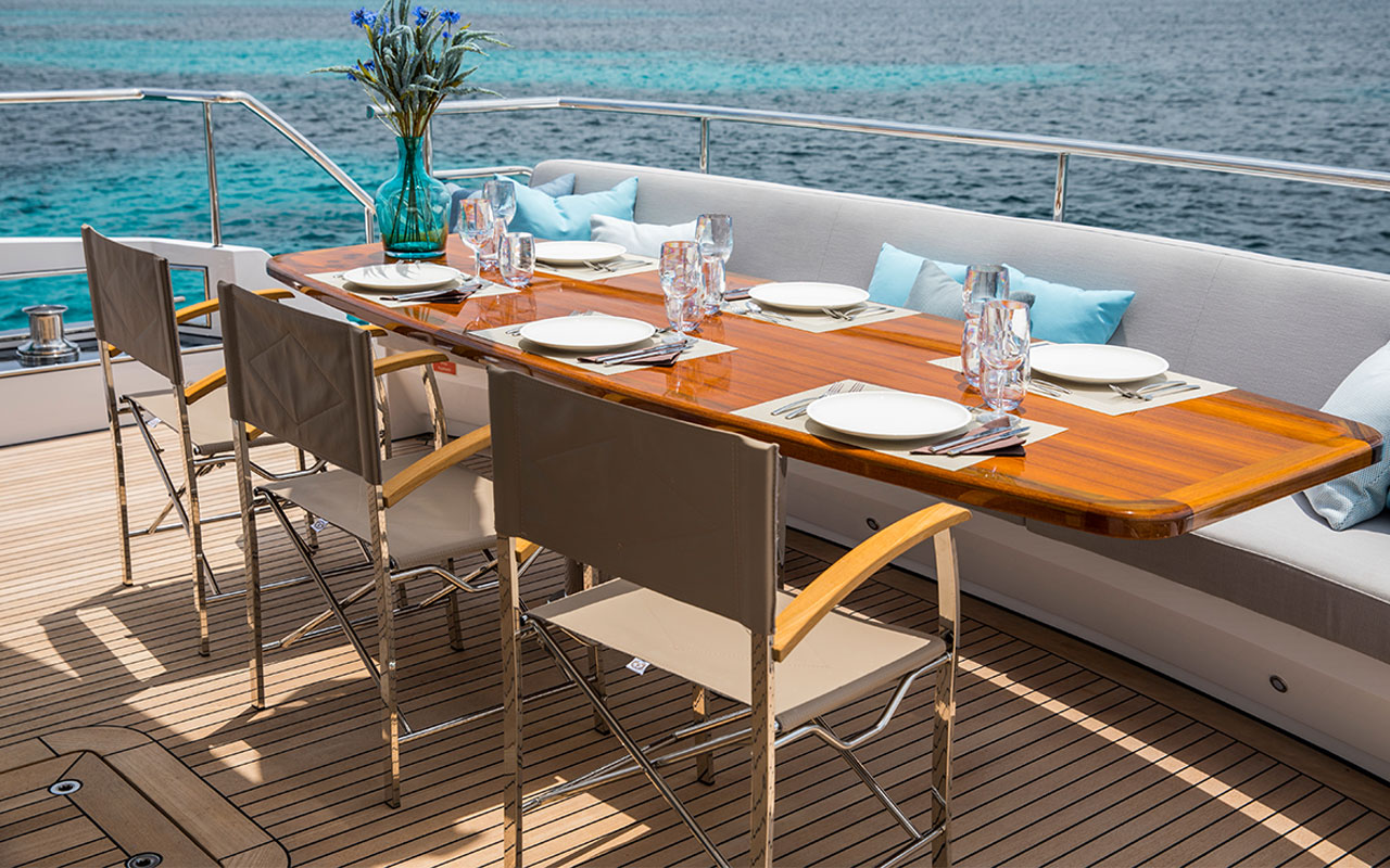 Yacht Charter Ibiza Vanquish VQ 82 Sea Story Cockpit Dining