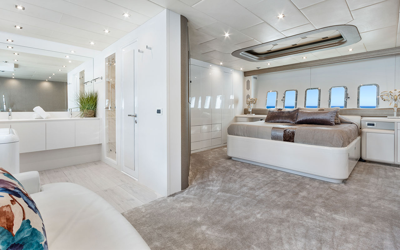Yacht Charter Ibiza Mangusta 108 lower deck master cabin