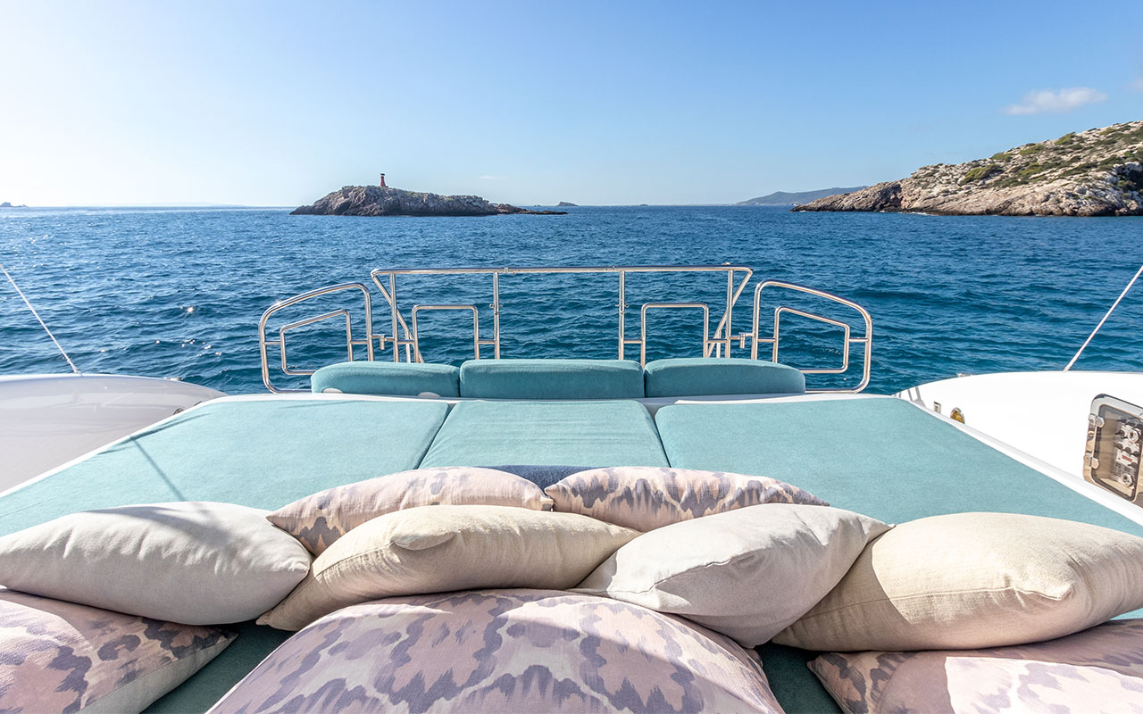 Yacht Charter Ibiza Mangusta 108 stern sun cushions