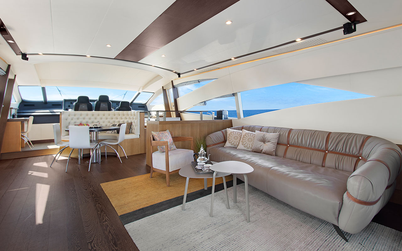 Yacht Charter Ibiza Pershing 90 main deck lounge