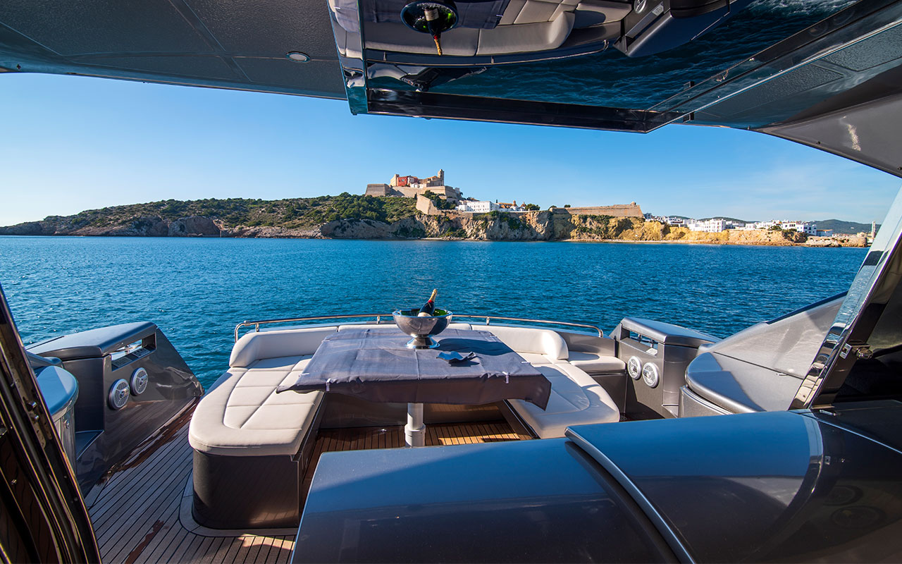 Yacht Charter Ibiza Pershing 62 cockpit dining