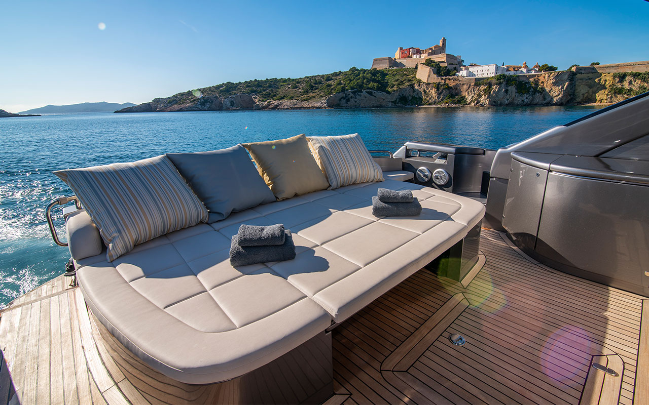 Yacht Charter Ibiza Pershing 62 cockpit sun cushions
