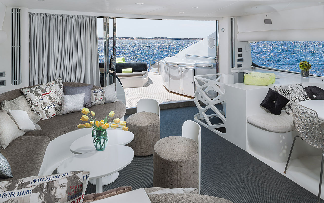 Yacht Charter Ibiza Sunseeker Predator 82 main deck lounge